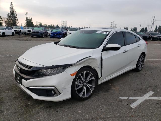 Изображение 1 2020 HONDA CIVIC TOURING 2020 с VIN 19XFC1F90LE200921