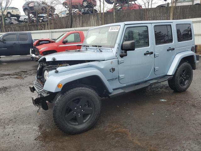 Image 1 of 2012 JEEP WRANGLER UNLIMITED SAHARA 2012 with VIN 1C4BJWEG1CL161684