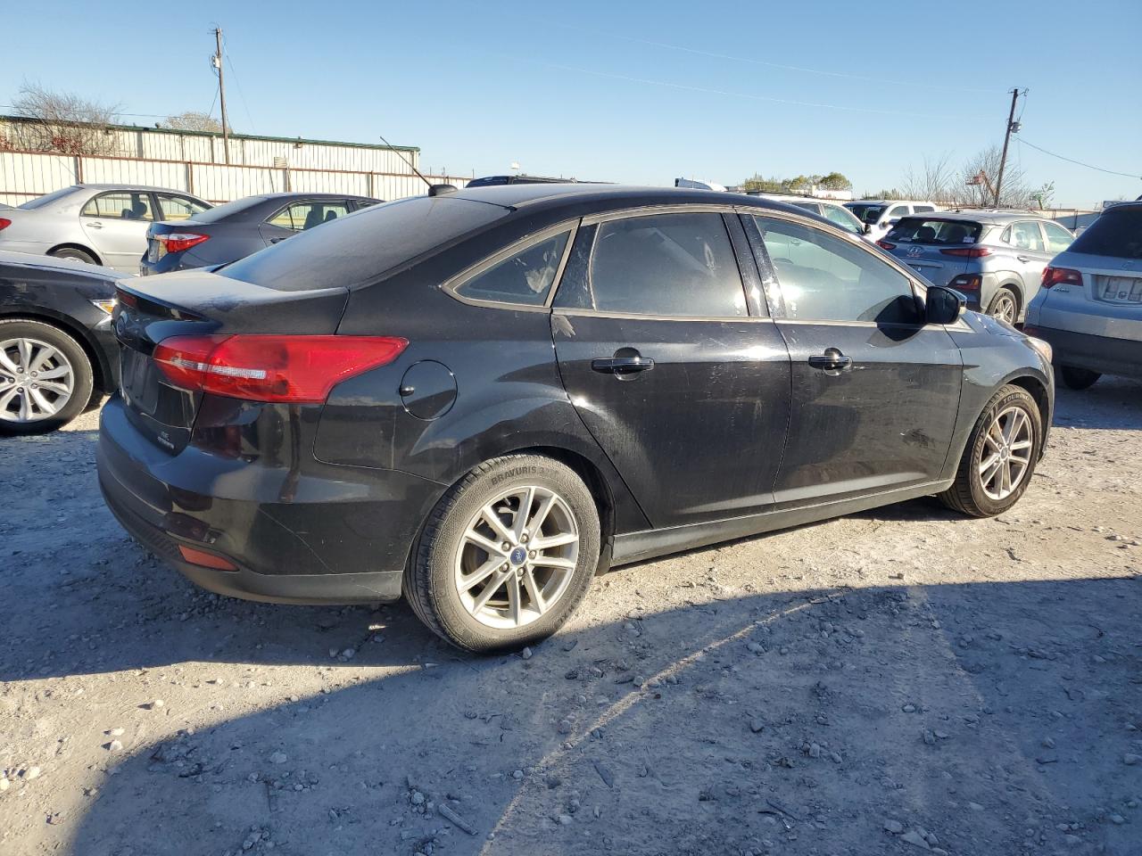 Image 3 of 2016 FORD FOCUS SE 2016 with VIN 1FADP3F28GL360705