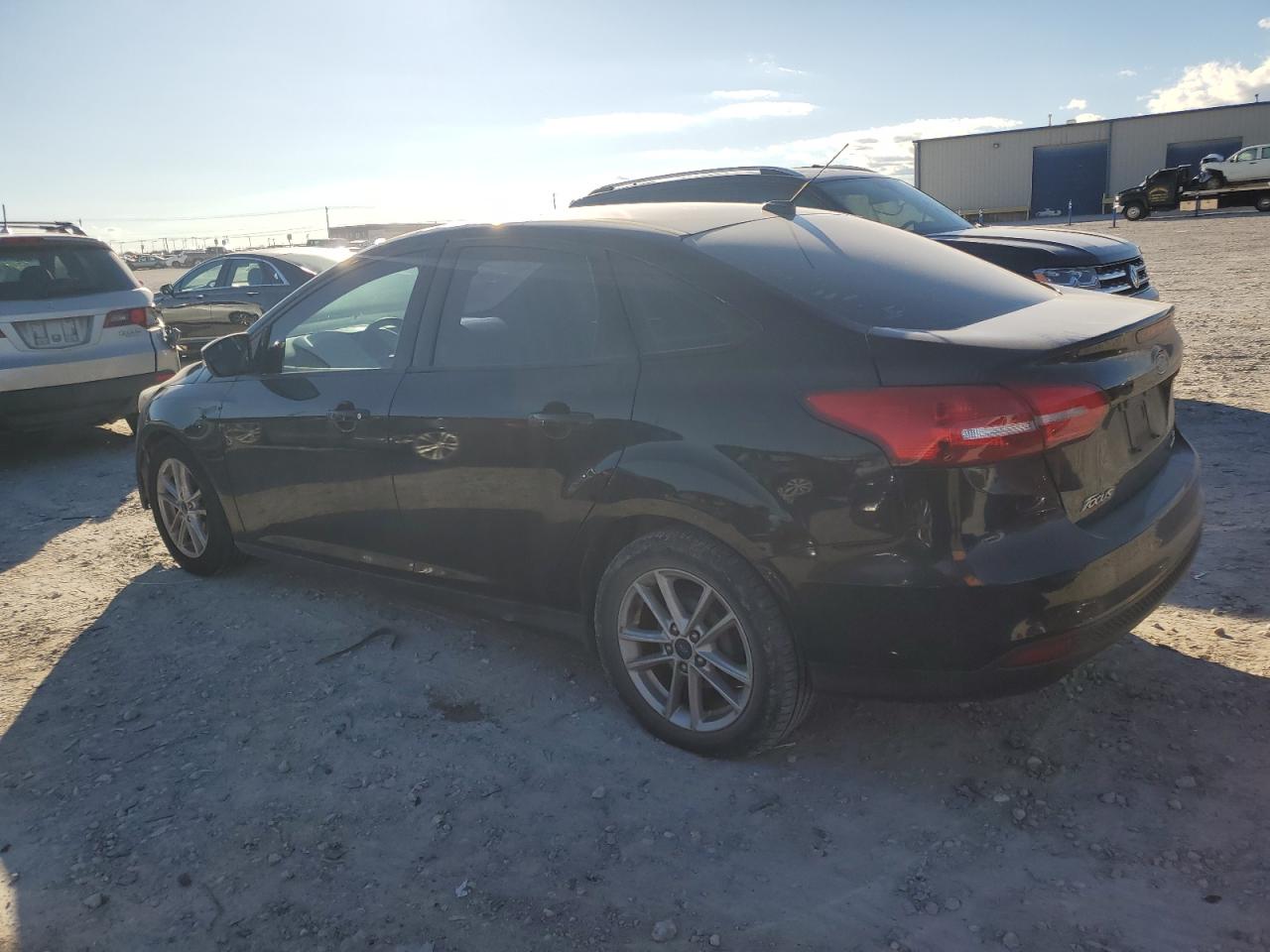 Image 2 of 2016 FORD FOCUS SE 2016 with VIN 1FADP3F28GL360705