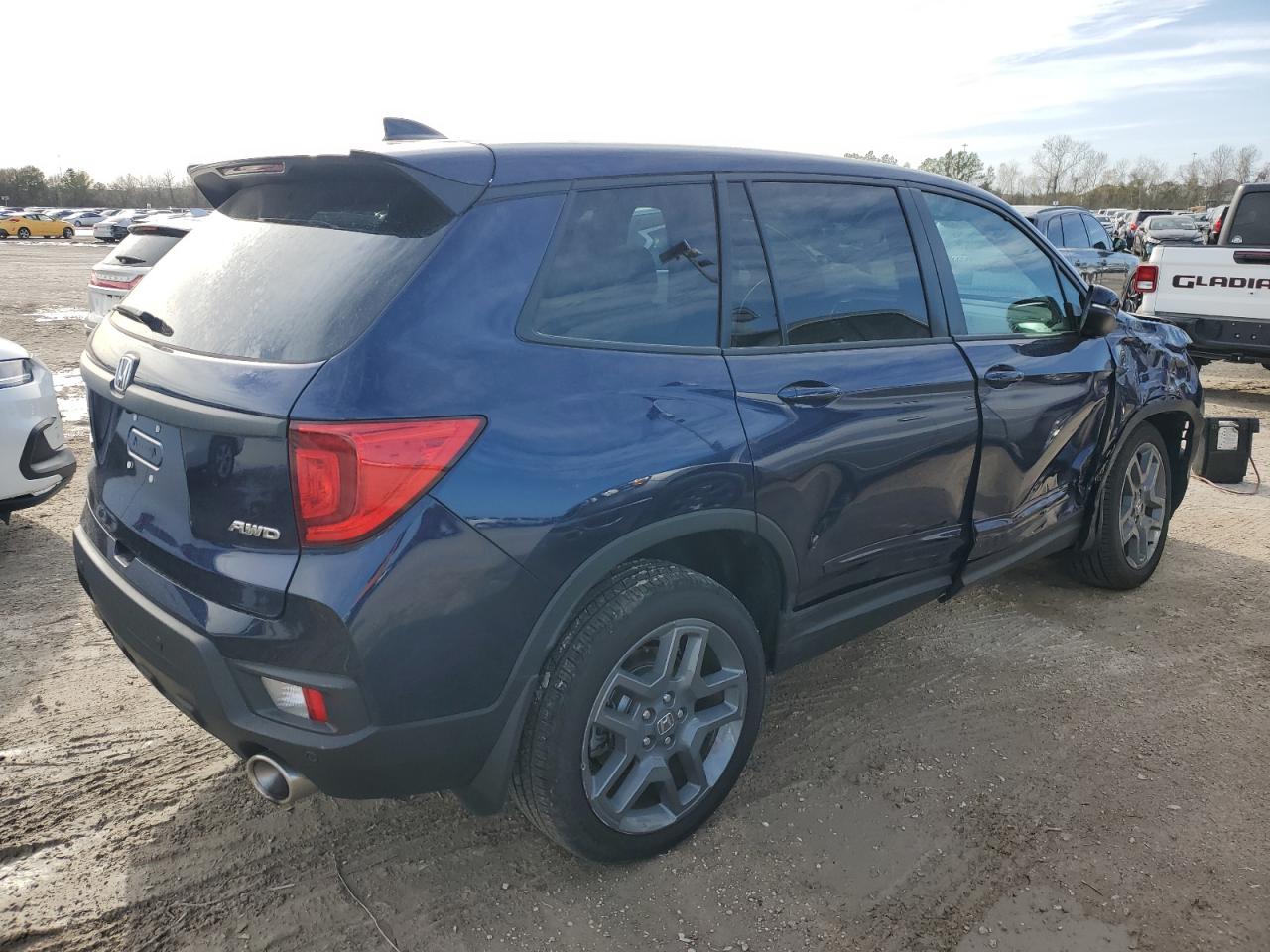 Изображение 3 2023 HONDA PASSPORT EXL 2023 с VIN 5FNYF8H50PB004917