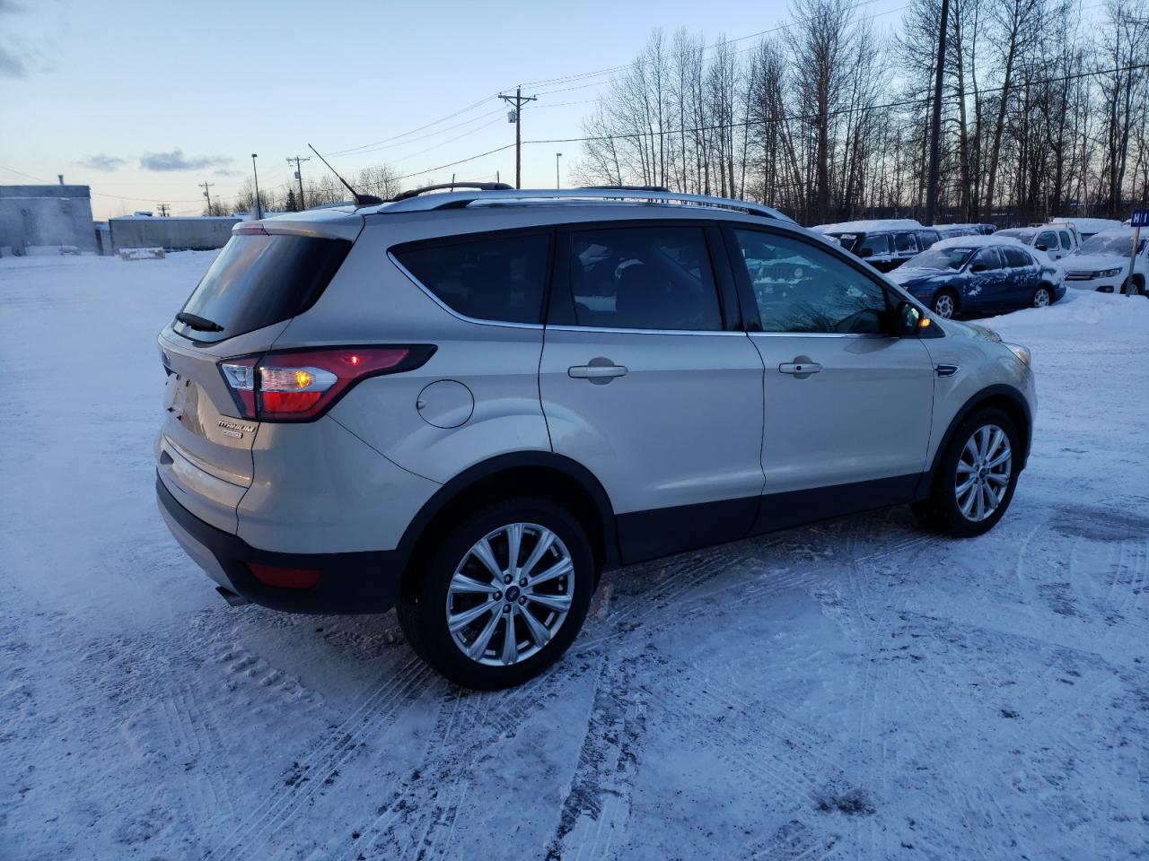 Image 3 of 2017 FORD ESCAPE TITANIUM 2017 with VIN 1FMCU0JD4HUA23834