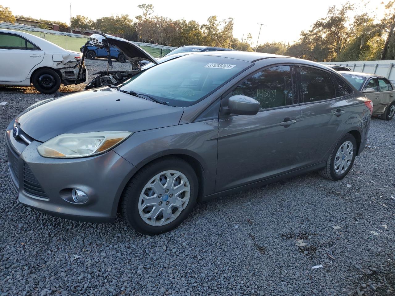 Image 1 of 2012 FORD FOCUS SE 2012 with VIN 1FAHP3F26CL166623