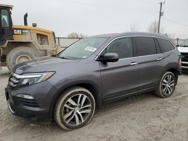 Изображение 1 2018 HONDA PILOT TOURING 2018 с VIN 5FNYF6H93JB021385