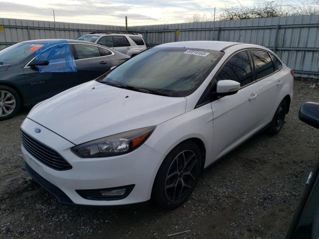 Obraz 1 z 2017 FORD FOCUS SE 2017 z VIN 1FADP3FE4HL348515