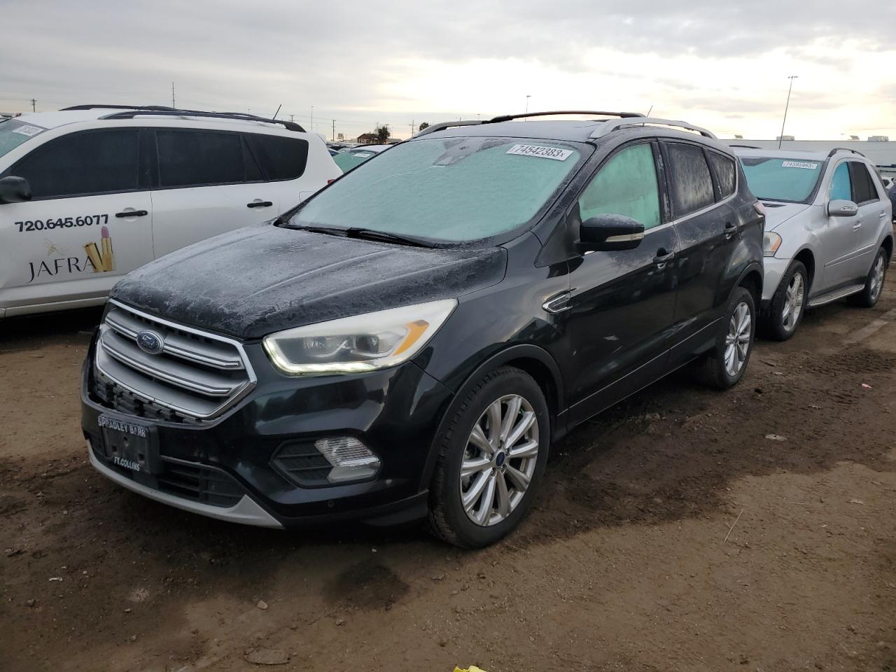 Image 1 of 2017 FORD ESCAPE TITANIUM 2017 with VIN 1FMCU9J90HUC38580