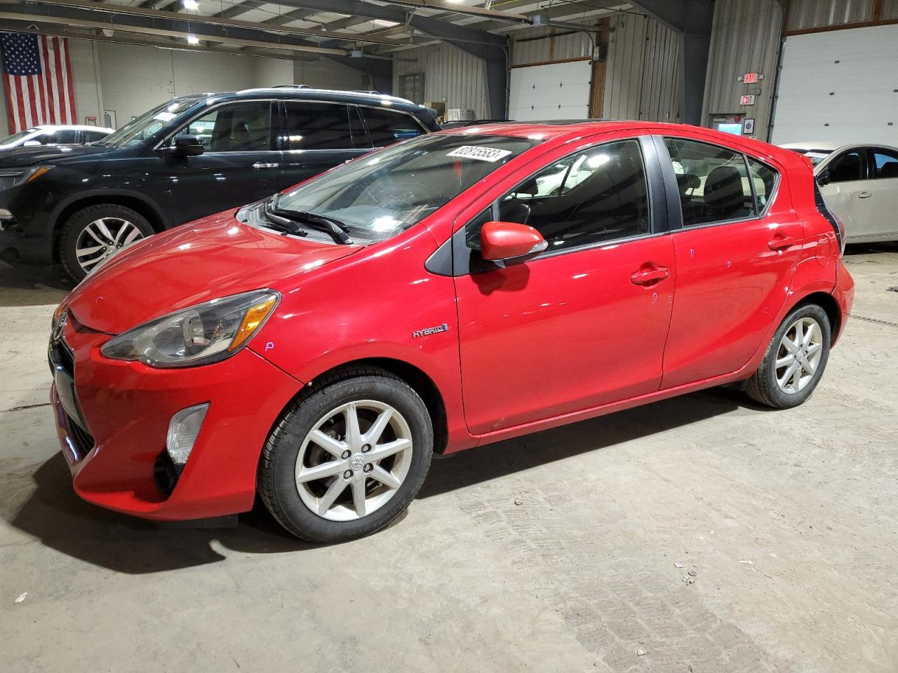 Image 1 of 2015 TOYOTA PRIUS C  2015 with VIN JTDKDTB35F1115007