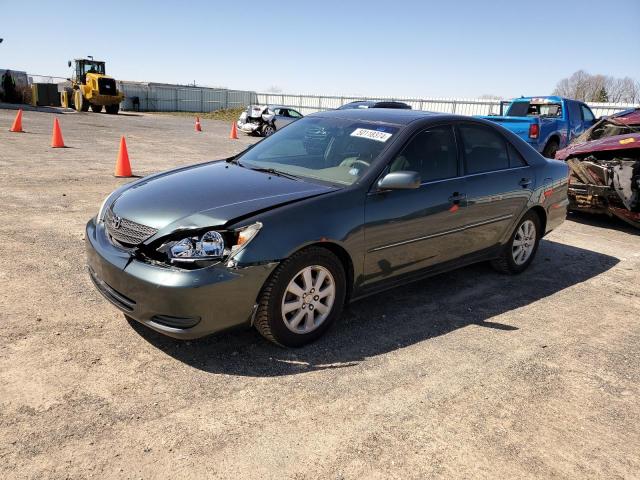 Obraz 1 z 2002 TOYOTA CAMRY LE 2002 z VIN 4T1BE30K42U622816