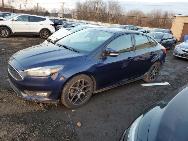 Obraz 1 z 2017 FORD FOCUS SEL 2017 z VIN 1FADP3H23HL274071