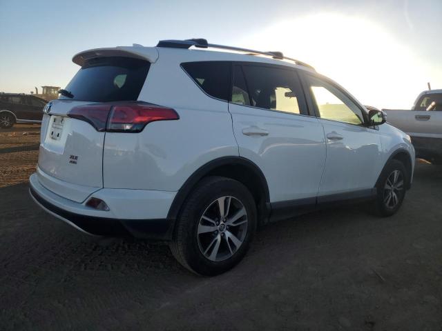 Изображение 3 2017 TOYOTA RAV4 XLE 2017 с VIN JTMRFREV0HD209953