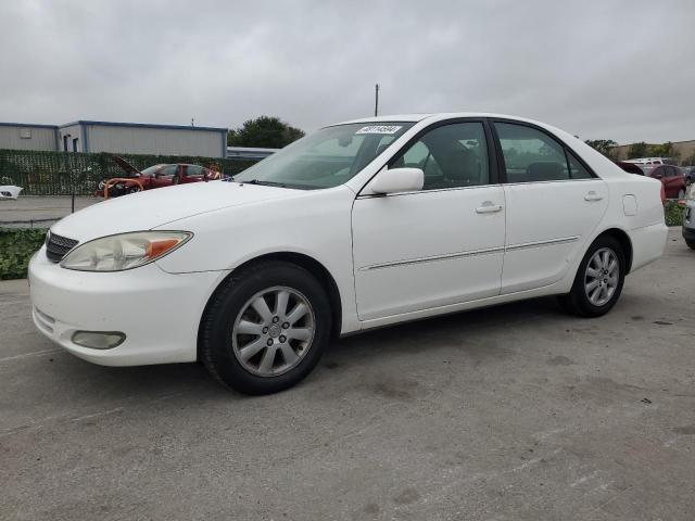 Obraz 1 z 2003 TOYOTA CAMRY LE 2003 z VIN JTDBF30K130151721