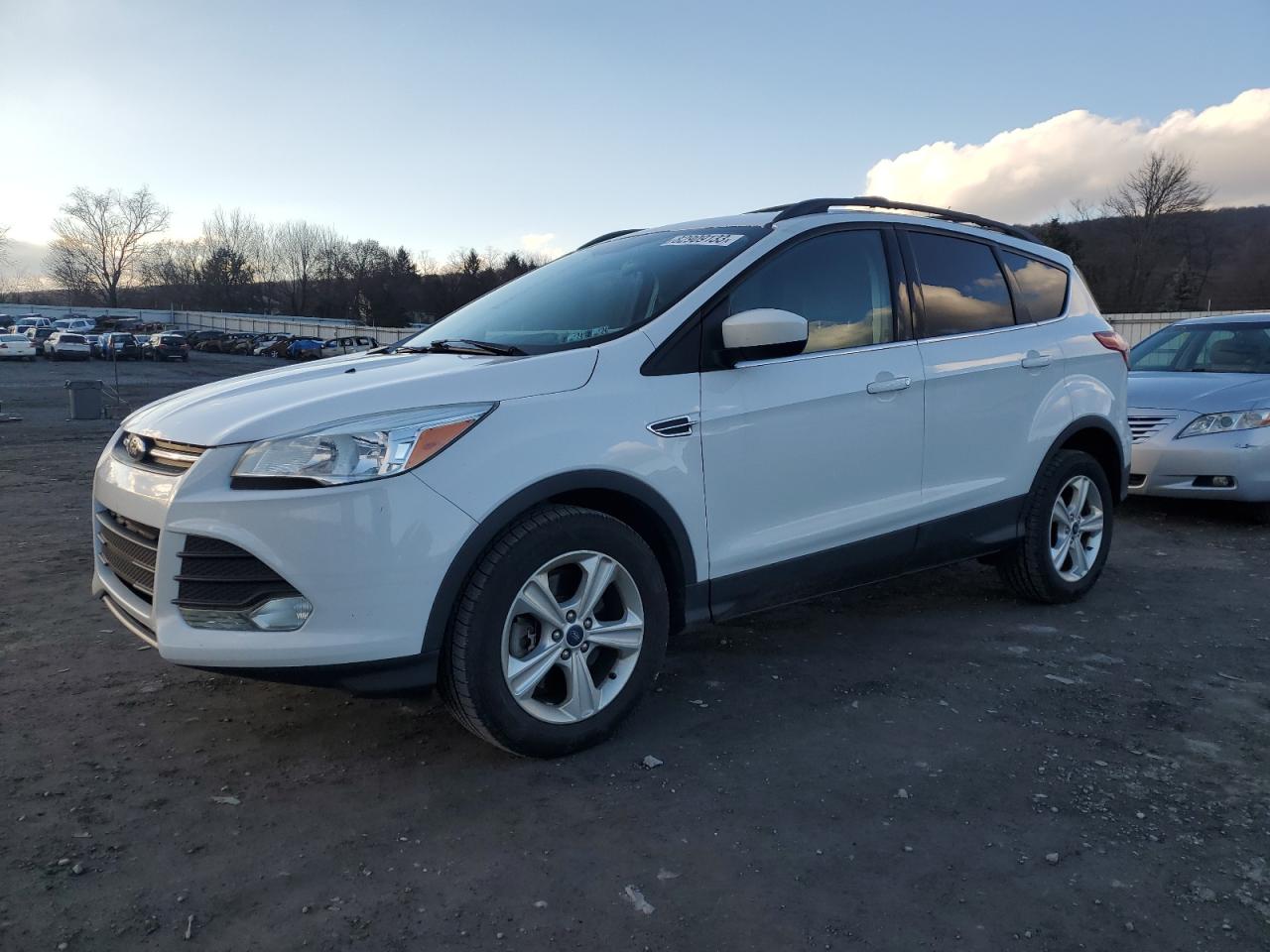 Obraz 1 z 2016 FORD ESCAPE SE 2016 z VIN 1FMCU9GX4GUB43038