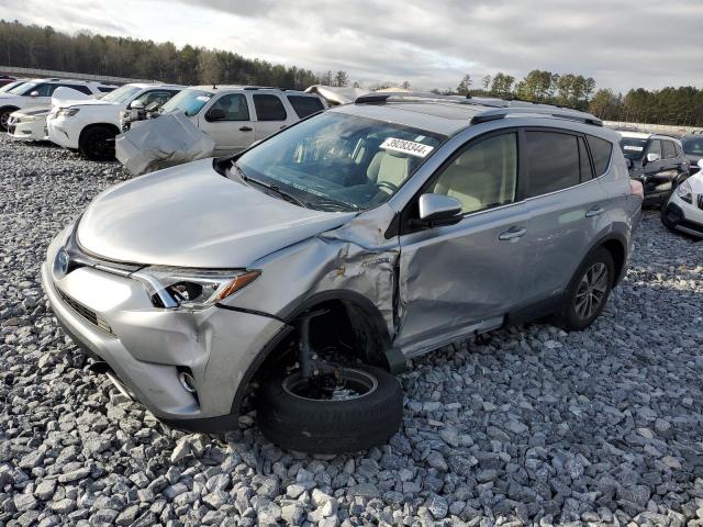 Image 1 of 2018 TOYOTA RAV4 HV LE 2018 with VIN JTMRJREV4JD204940