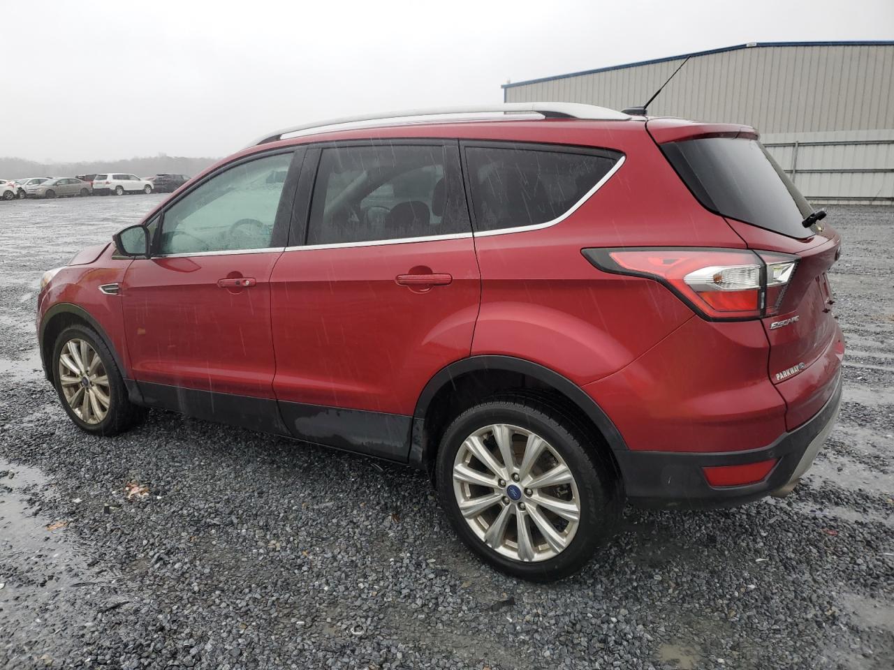 Obraz 2 z 2017 FORD ESCAPE TITANIUM 2017 z VIN 1FMCU0J99HUA57618
