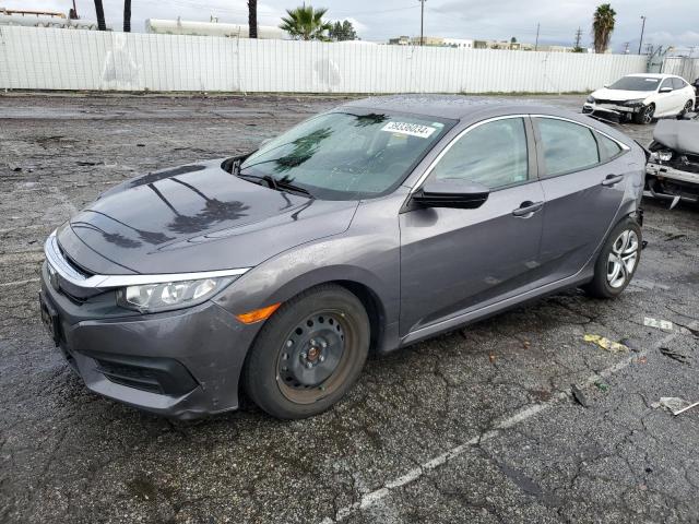 Obraz 1 z 2018 HONDA CIVIC LX 2018 z VIN 19XFC2F52JE001790