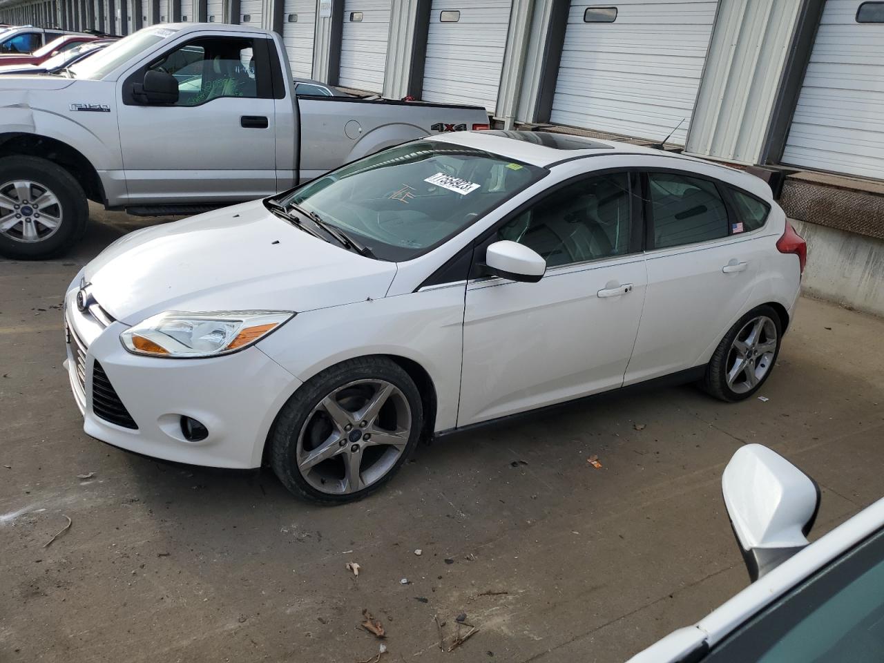 Image 1 of 2014 FORD FOCUS TITANIUM 2014 with VIN 1FADP3N23EL188937