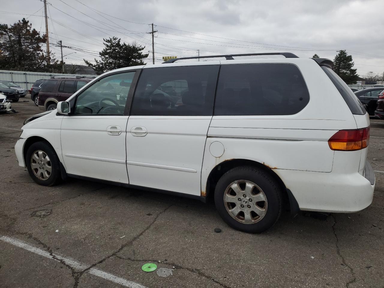 Изображение 2 2002 HONDA ODYSSEY EXL 2002 с VIN 2HKRL18712H513057