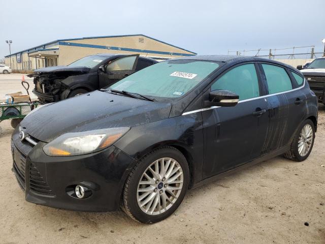 Image 1 of 2014 FORD FOCUS TITANIUM 2014 with VIN 1FADP3N22EL451340