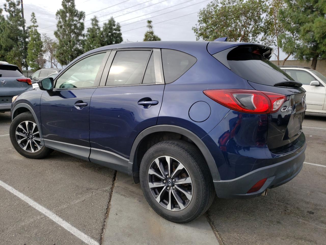 Obraz 2 z 2014 MAZDA CX-5 TOURING 2014 z VIN JM3KE2CY1E0330154