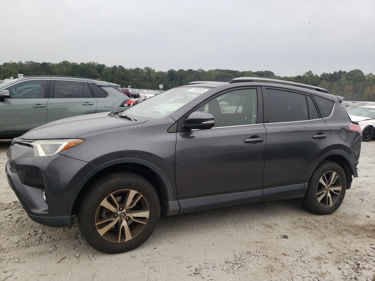 Image 1 of 2017 TOYOTA RAV4 XLE 2017 with VIN JTMWFREVXHJ136935