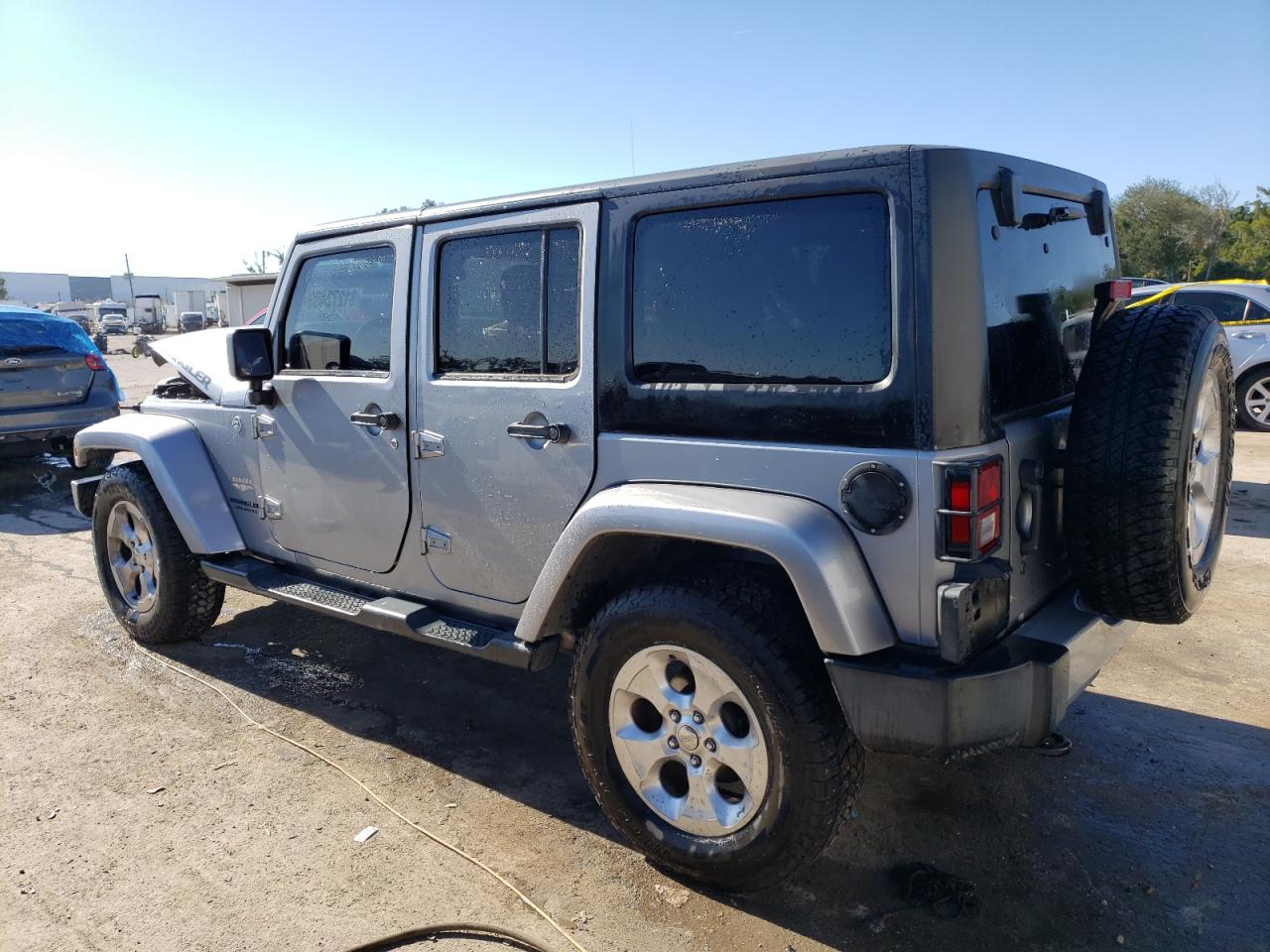 Изображение 2 2013 JEEP WRANGLER UNLIMITED SAHARA 2013 с VIN 1C4BJWEG5DL655516