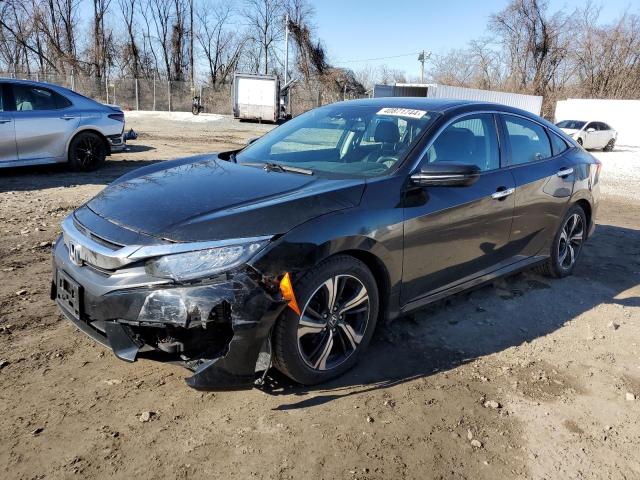 Obraz 1 z 2016 HONDA CIVIC TOURING 2016 z VIN 2HGFC1F92GH656060