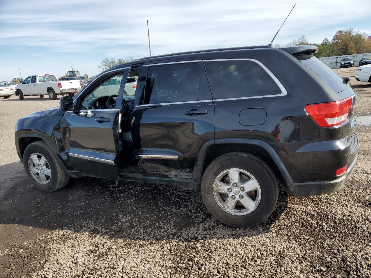 Изображение 2 2012 JEEP GRAND CHEROKEE LAREDO 2012 с VIN 1C4RJEAG4CC355298