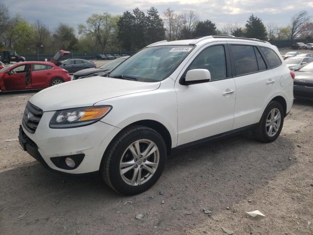 Image 1 of 2012 HYUNDAI SANTA FE LIMITED 2012 with VIN 5XYZKDAG1CG103267
