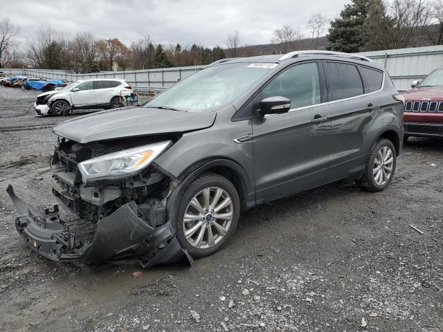 Obraz 1 z 2017 FORD ESCAPE TITANIUM 2017 z VIN 1FMCU9JD6HUD30135