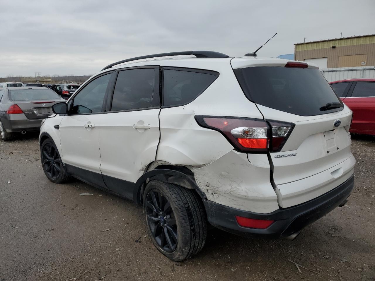 Изображение 2 2017 FORD ESCAPE TITANIUM 2017 с VIN 1FMCU0J90HUC49834