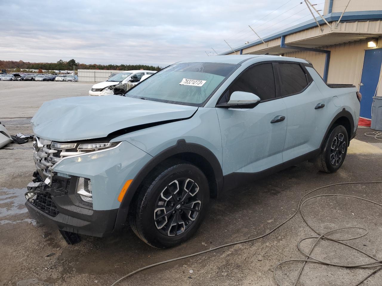 Image 1 of 2022 HYUNDAI SANTA CRUZ SEL 2022 with VIN 5NTJBDAE0NH028781