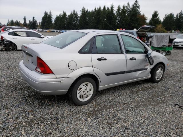 Obraz 3 z 2004 FORD FOCUS LX 2004 z VIN 1FAFP33ZX4W147386