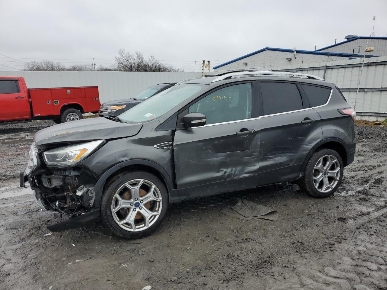 Image 1 of 2017 FORD ESCAPE TITANIUM 2017 with VIN 1FMCU9J96HUA17873