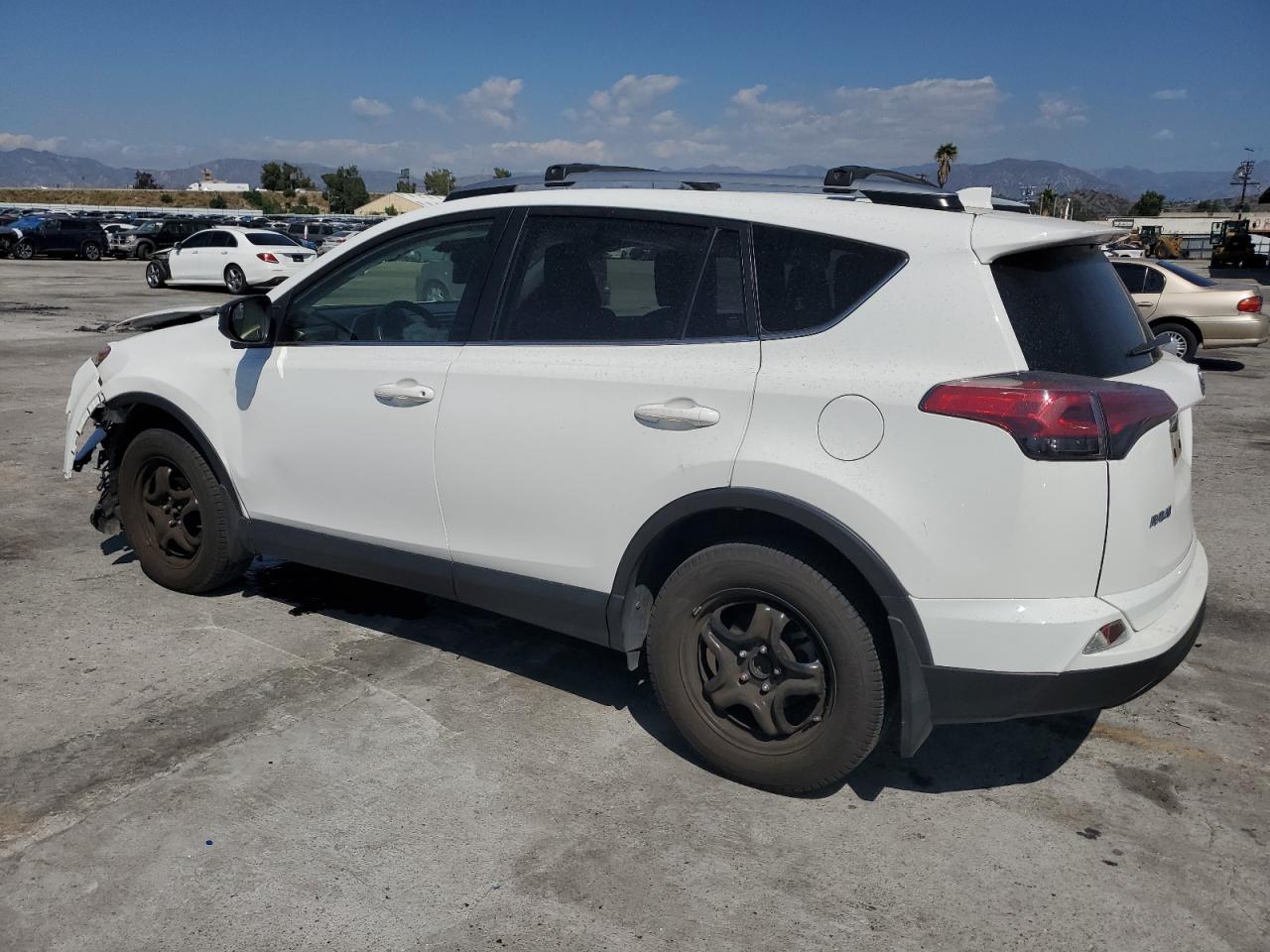 Image 2 of 2018 TOYOTA RAV4 LE 2018 with VIN JTMZFREVXJJ177214