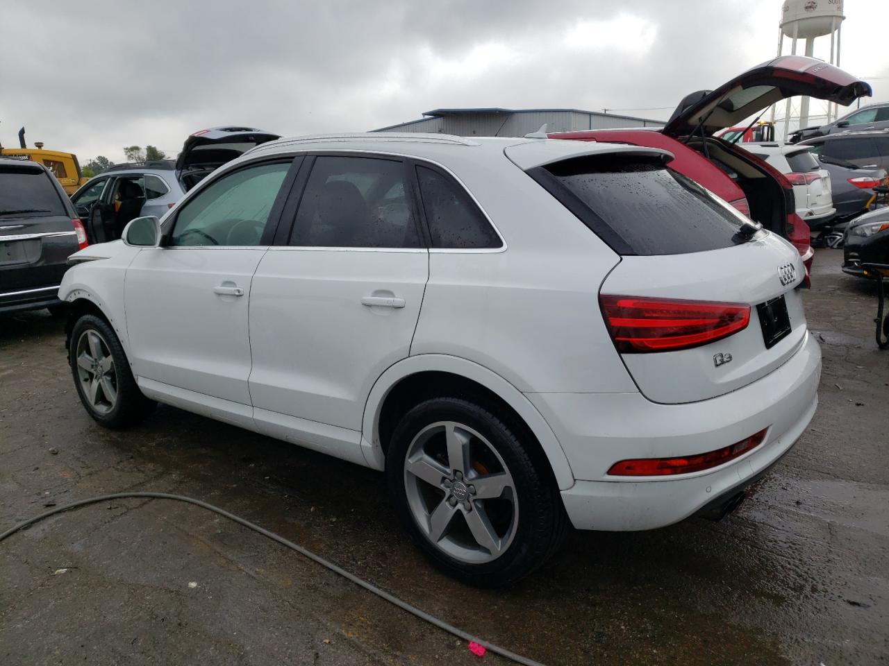 Image 2 of 2015 AUDI Q3 PRESTIGE 2015 with VIN WA1FFCFS2FR010739