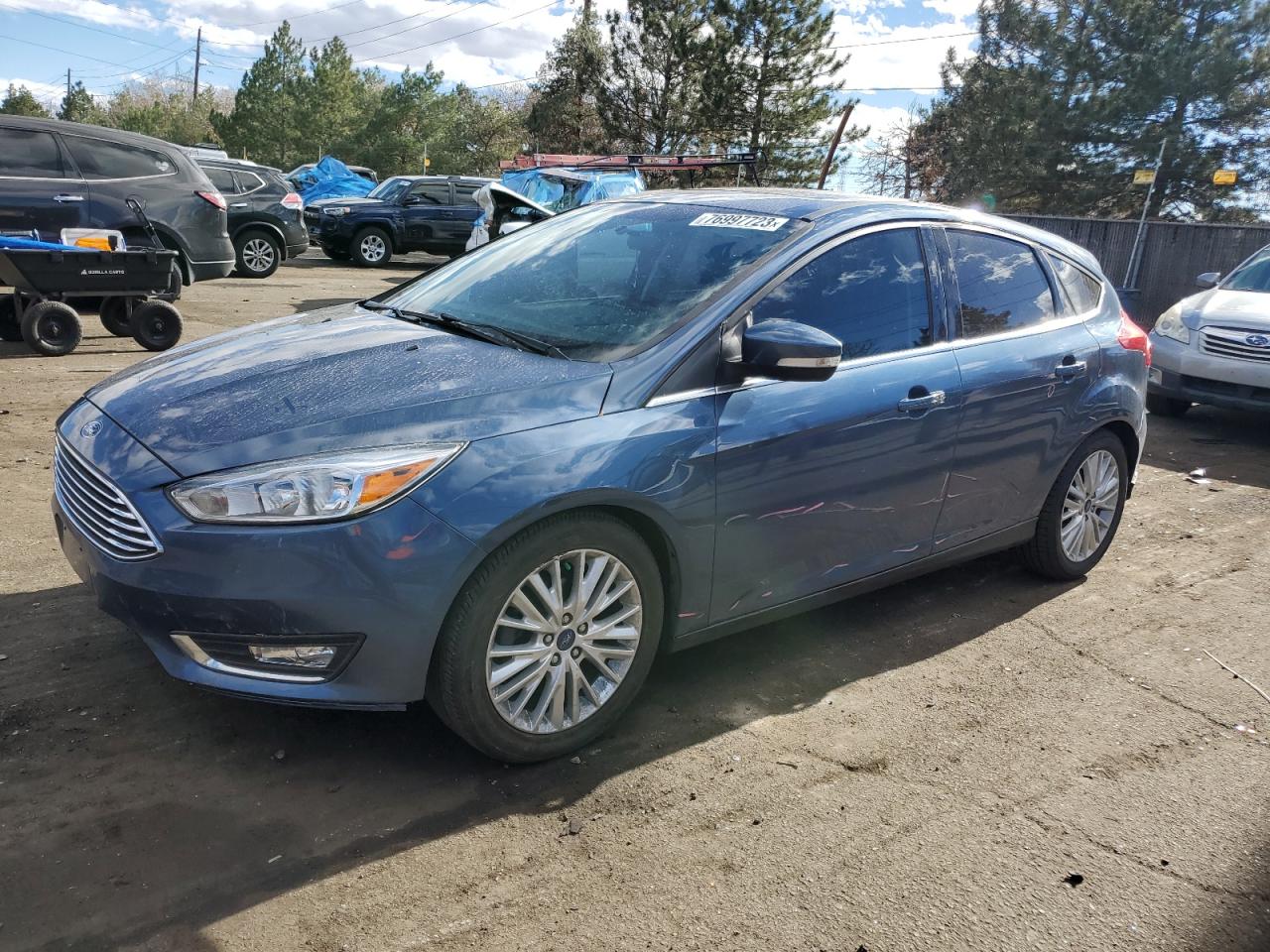 Image 1 of 2018 FORD FOCUS TITANIUM 2018 with VIN 1FADP3N20JL232824