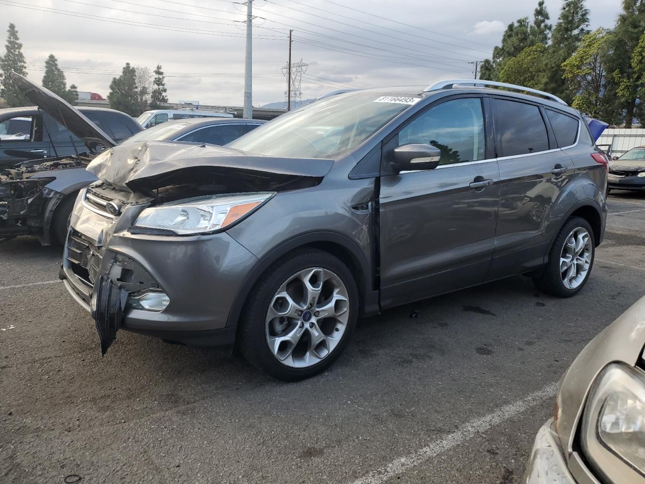 Image 1 of 2014 FORD ESCAPE TITANIUM 2014 with VIN 1FMCU0J96EUA30100