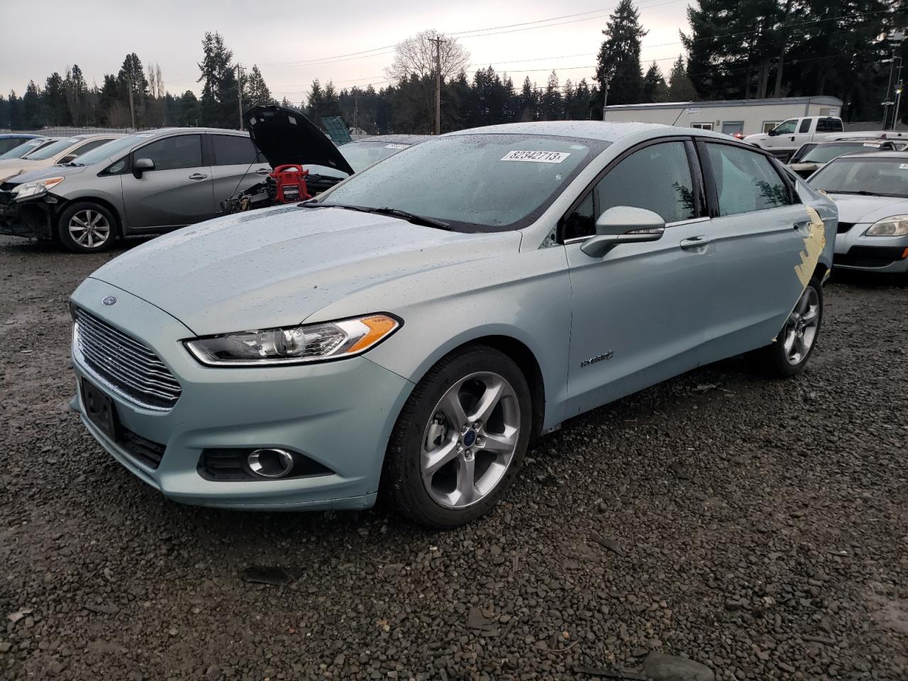 Image 1 of 2014 FORD FUSION SE HYBRID 2014 with VIN 3FA6P0LU4ER299560