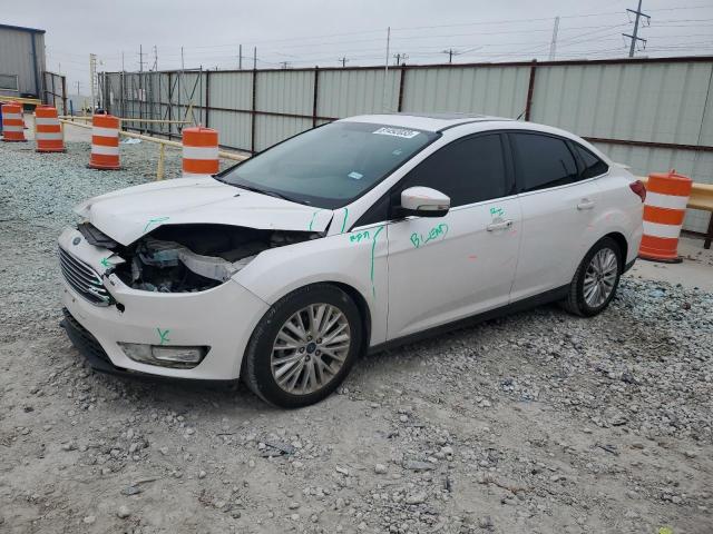 Image 1 of 2017 FORD FOCUS TITANIUM 2017 with VIN 1FADP3J2XHL332591