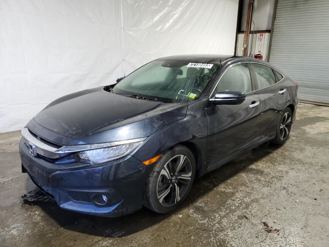 Obraz 1 z 2018 HONDA CIVIC TOURING 2018 z VIN 2HGFC1F97JH644798