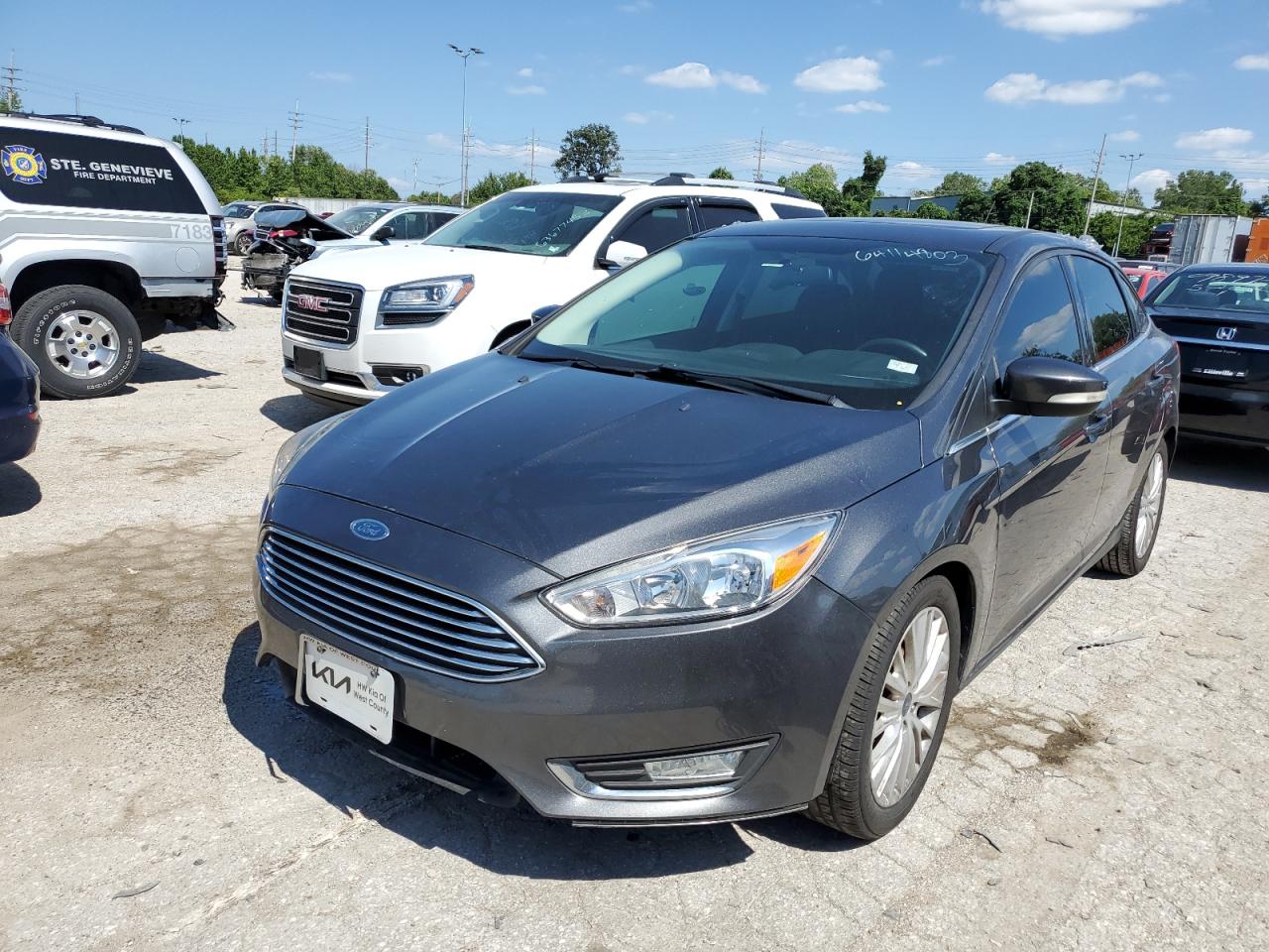 Obraz 1 z 2017 FORD FOCUS TITANIUM 2017 z VIN 1FADP3J20HL295728