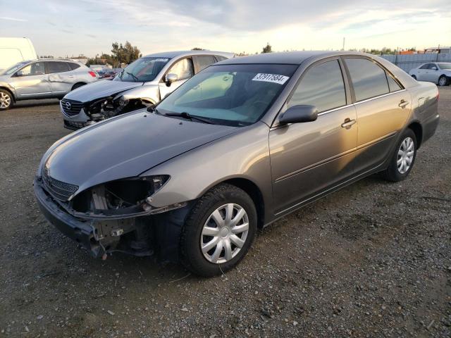 Obraz 1 z 2002 TOYOTA CAMRY LE 2002 z VIN 4T1BE30K82U569280