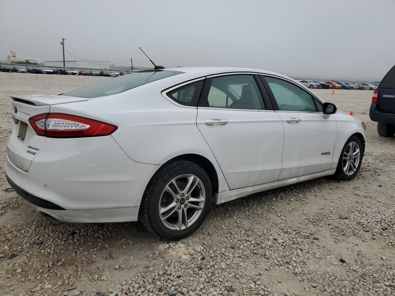 Image 3 of 2016 FORD FUSION TITANIUM HEV 2016 with VIN 3FA6P0RU0GR286105