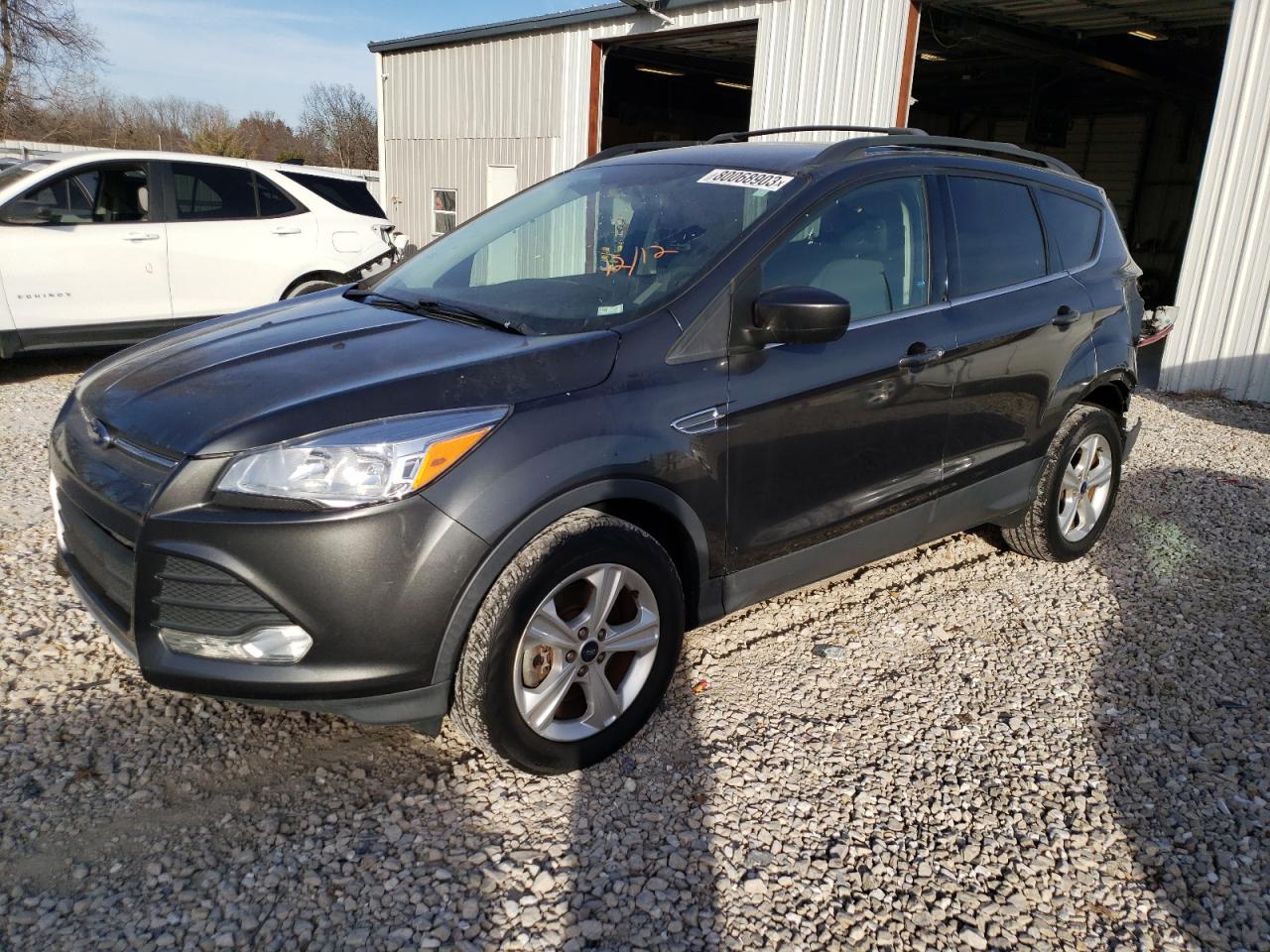 Image 1 of 2016 FORD ESCAPE SE 2016 with VIN 1FMCU9GX2GUC17654