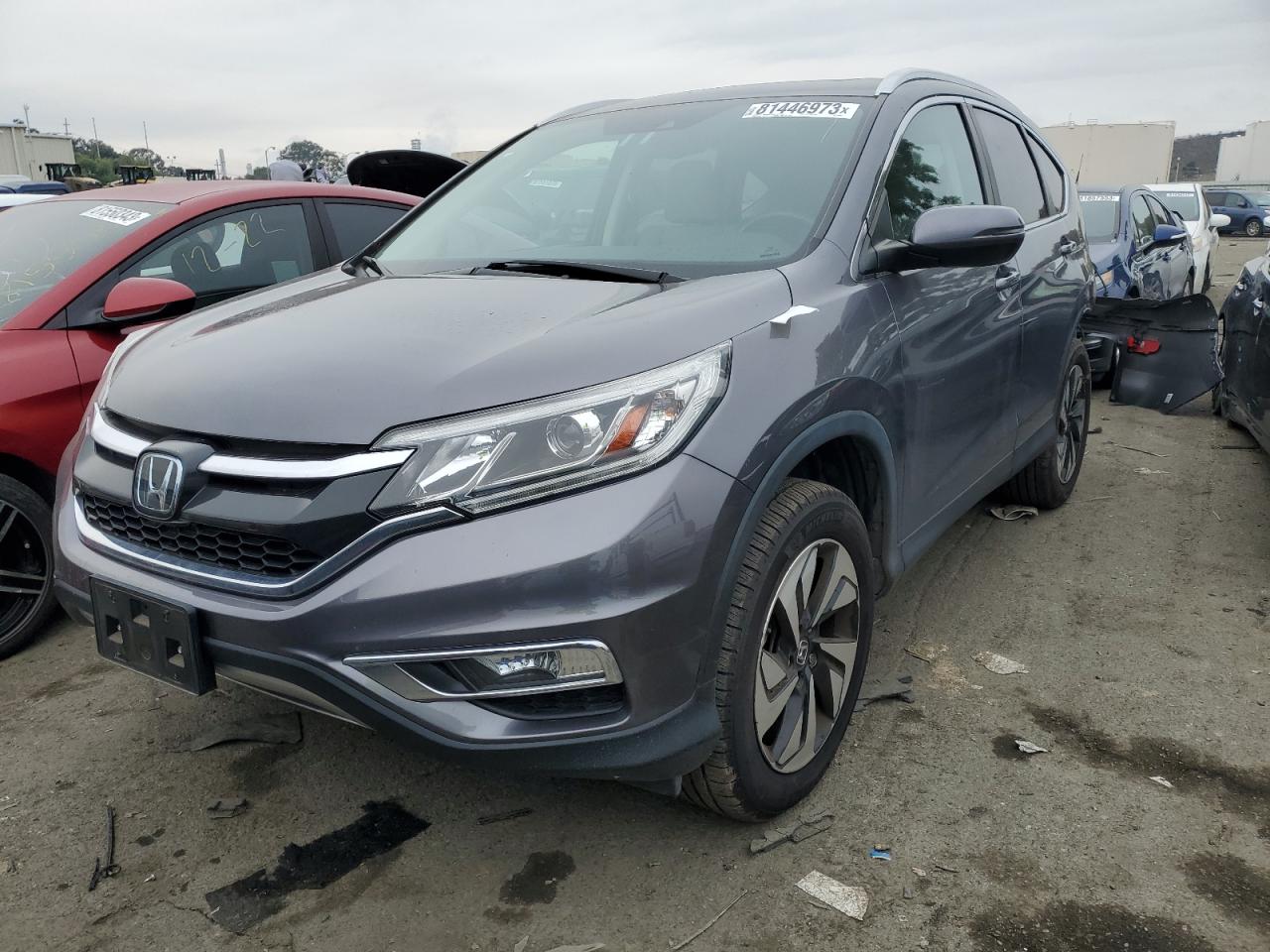Obraz 1 z 2015 HONDA CR-V TOURING 2015 z VIN 5J6RM4H97FL085037