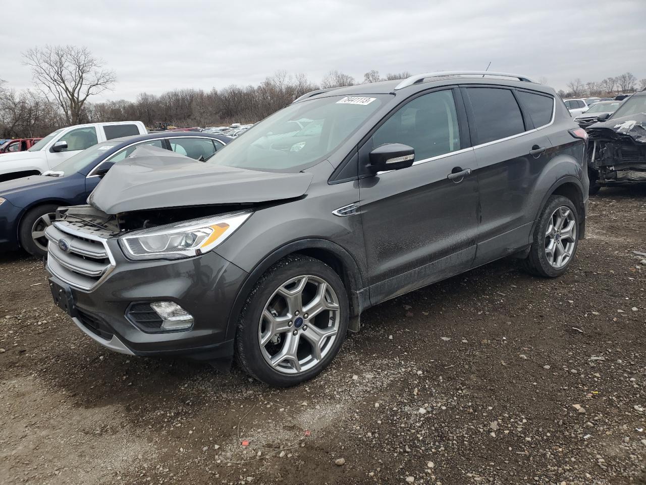 Image 1 of 2017 FORD ESCAPE TITANIUM 2017 with VIN 1FMCU0JD1HUA32166