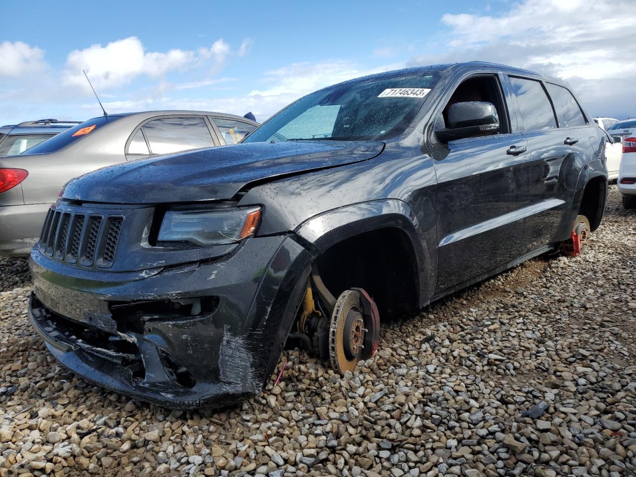 Изображение 1 Jeep Grand Cherokee Srt-8 2015 с VIN 1C4RJFDJ5FC921793