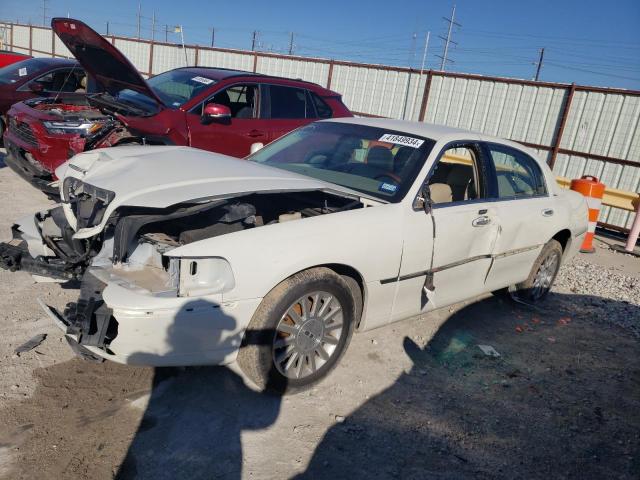 Obraz 1 z 2004 LINCOLN TOWN CAR ULTIMATE 2004 z VIN 1LNHM83W24Y604612