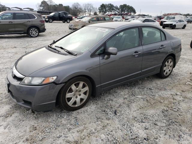 Image 1 of 2011 HONDA CIVIC LX 2011 with VIN 19XFA1F50BE049063