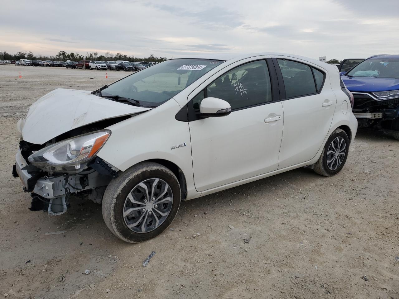 Image 1 of 2015 TOYOTA PRIUS C  2015 with VIN JTDKDTB34F1097308